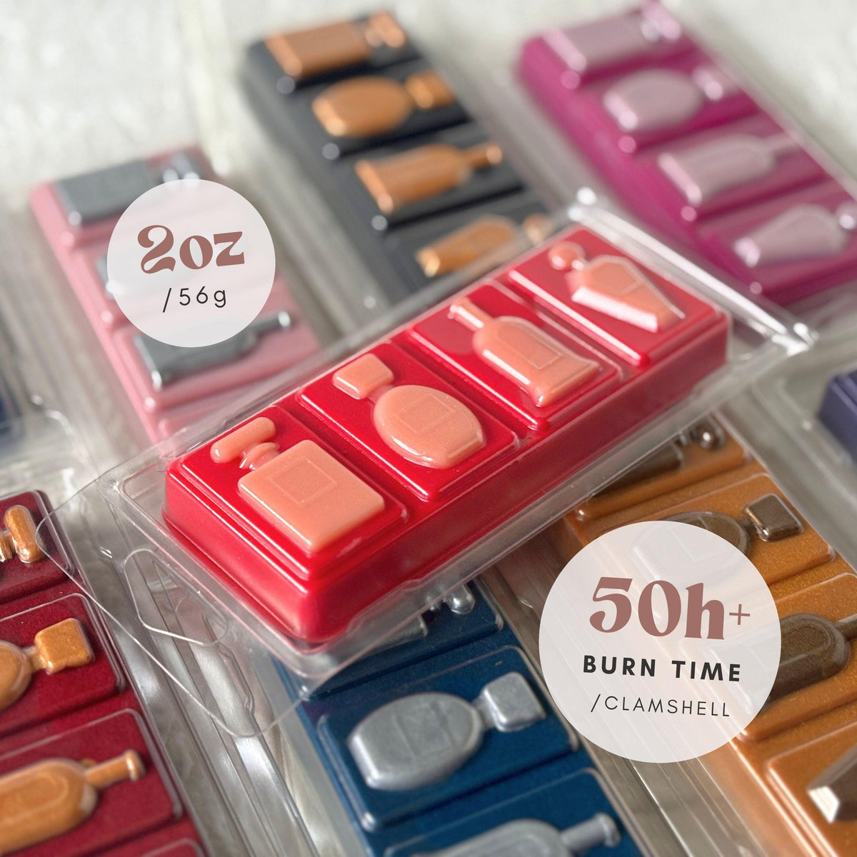 Perfume-inspired soy wax snap bars hand-poured by FAYDEN in Scotland using natural soy wax and premium fragrance oils. The image shows colourful, beautifully detailed wax melt snap bars in recyclable clear packaging, inspired by popular designer perfumes. Individual sample bars and 2oz clamshells are available, along with 3, 5 and 10-scent Discovery Boxes for exploring a selection of fragrances.