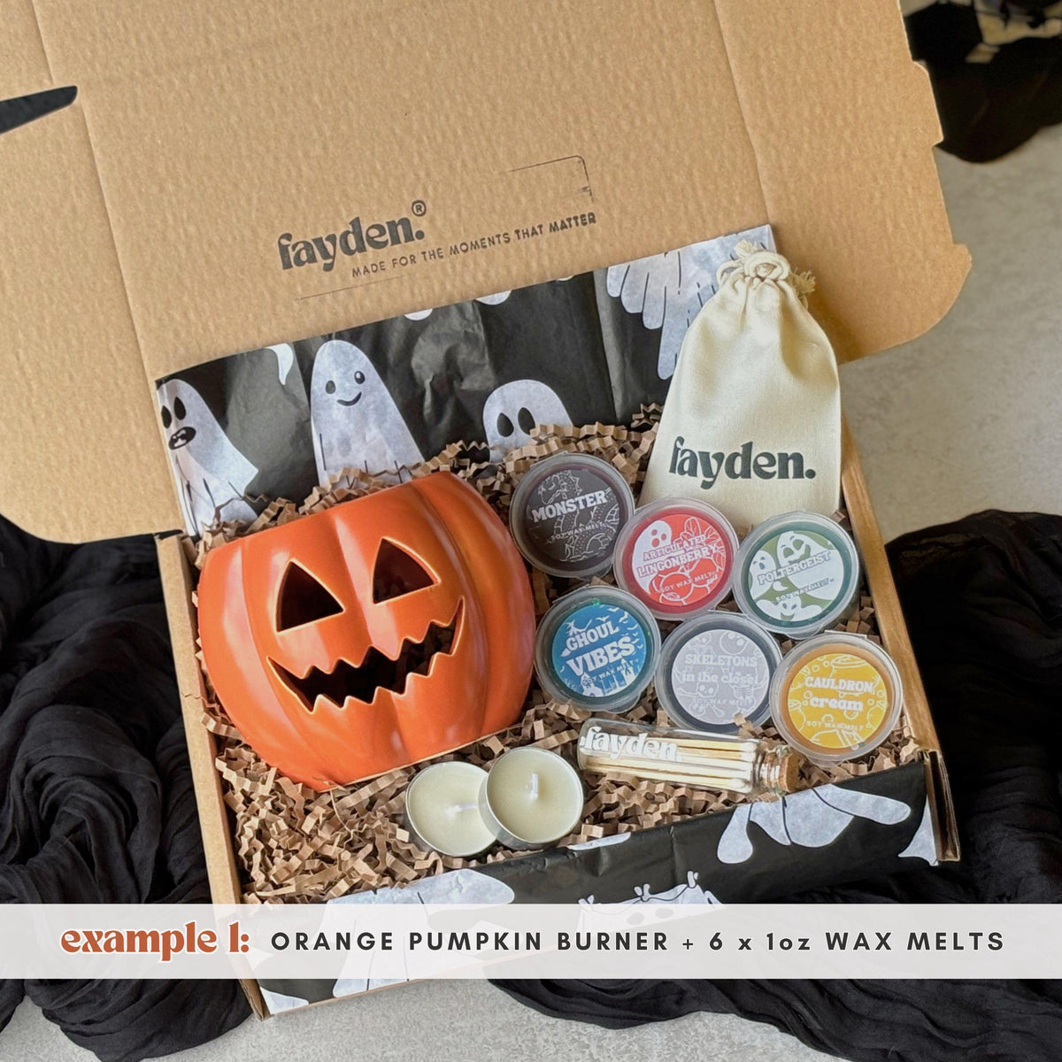 Halloween wax melt burner gift set in a spooky FAYDEN gift box, featuring an orange pumpkin burner, white mummy burner, assorted Halloween wax melts, tealights and a handmade gift-ready presentation  Halloween Wax Melts
Strong Wax Melts
Pumpkin Spice Melts
Spooky Surprise Gift
Hug In A Box Gifts
Halloween Pocket Hug
Mystery Sampler Box
Boo Basket Gift Idea
Autumn Scents
Melts Discovery Box
Build Your Own Set
Custom Halloween Box
Home Fragrance Gift