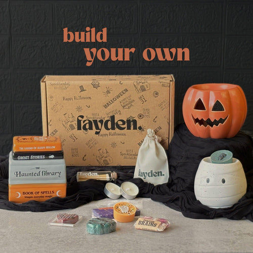 Halloween wax melt burner gift set in a spooky FAYDEN gift box, featuring an orange pumpkin burner, white mummy burner, assorted Halloween wax melts, tealights and a handmade gift-ready presentation  Halloween Wax Melts
Strong Wax Melts
Pumpkin Spice Melts
Spooky Surprise Gift
Hug In A Box Gifts
Halloween Pocket Hug
Mystery Sampler Box
Boo Basket Gift Idea
Autumn Scents
Melts Discovery Box
Build Your Own Set
Custom Halloween Box
Home Fragrance Gift