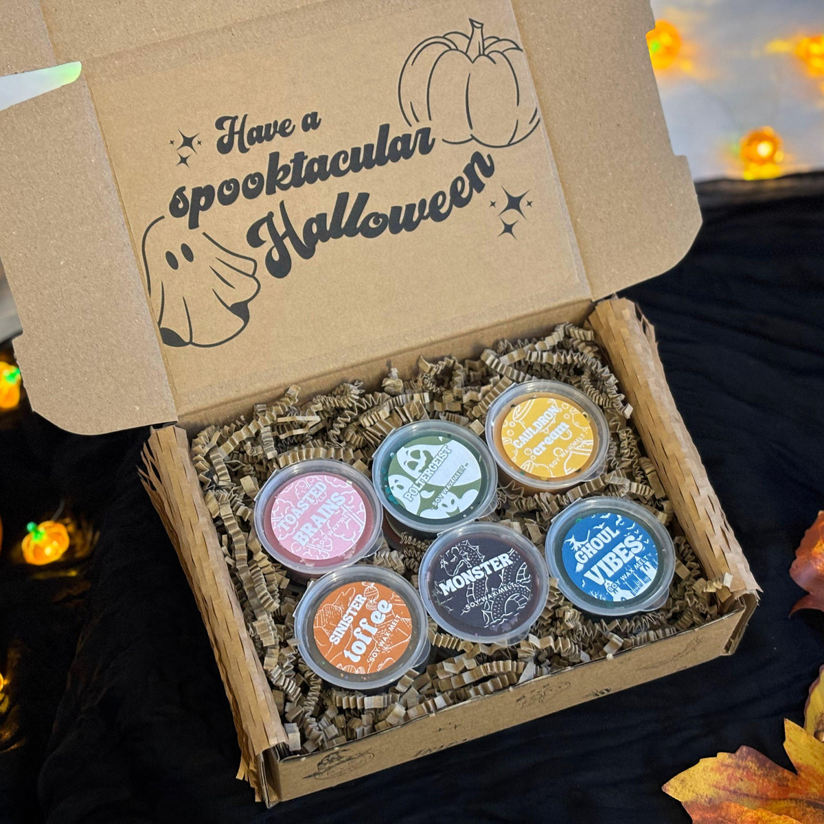 Halloween wax melt bundle gift set in a spooky FAYDEN gift box. Assortment of colourful Halloween soy wax melts including scented wax melt pots and decorative hand-poured melts in pumpkin, ghost, skull and seasonal designs. Halloween Wax Melts
Wax Melt Mystery Box
Pumpkin Spice Melts
Spooky Surprise Gift
Hug In A Box Gifts
Halloween Pocket Hug
Mystery Sampler Box
Boo Basket Gift Idea
Autumn Scents Fall
Cosy Home Fragrance
Scented Soy Wax Melt
Discovery Gift Box
Wax Melt Collection Halloween